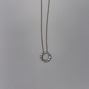 White gold circle diamond pendant